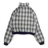 reversible check pattern zip stand