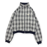 reversible check pattern zip stand