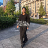 Leopard zip up knit polo