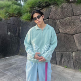 Leopard zip up knit polo