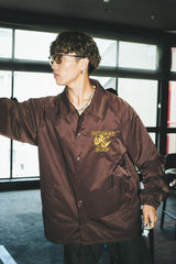 兩個面部標誌教練夾克