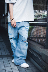 國王徽標損壞牛仔布