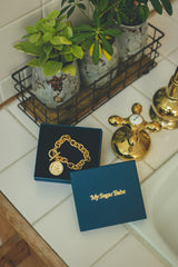 MSB coin motif bracelet