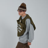 搖搖欲墜的新聞紙背心