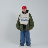 搖搖欲墜的新聞紙背心