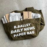 搖搖欲墜的新聞紙背心