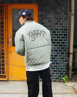 Checked fake down jacket