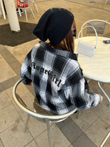 ng塗在休息板襯衫上