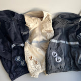 두 얼굴 로고 트랙 자켓