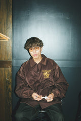 兩個面部標誌教練夾克