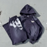 universal logo powder spray sweat pants