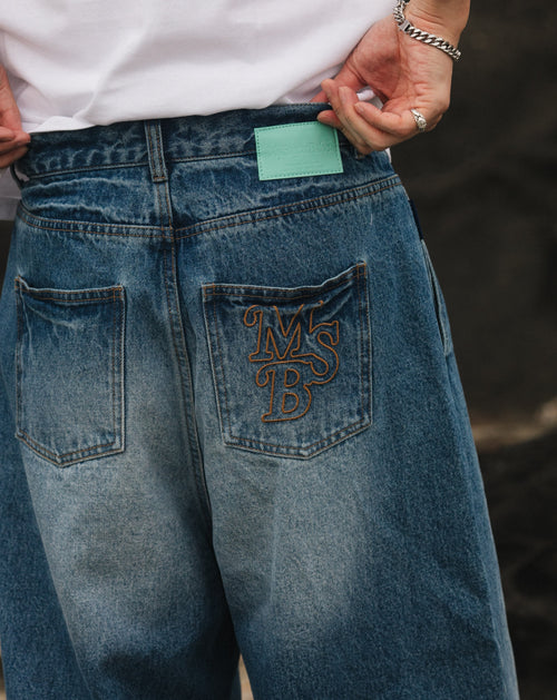 wide tuck denim pants