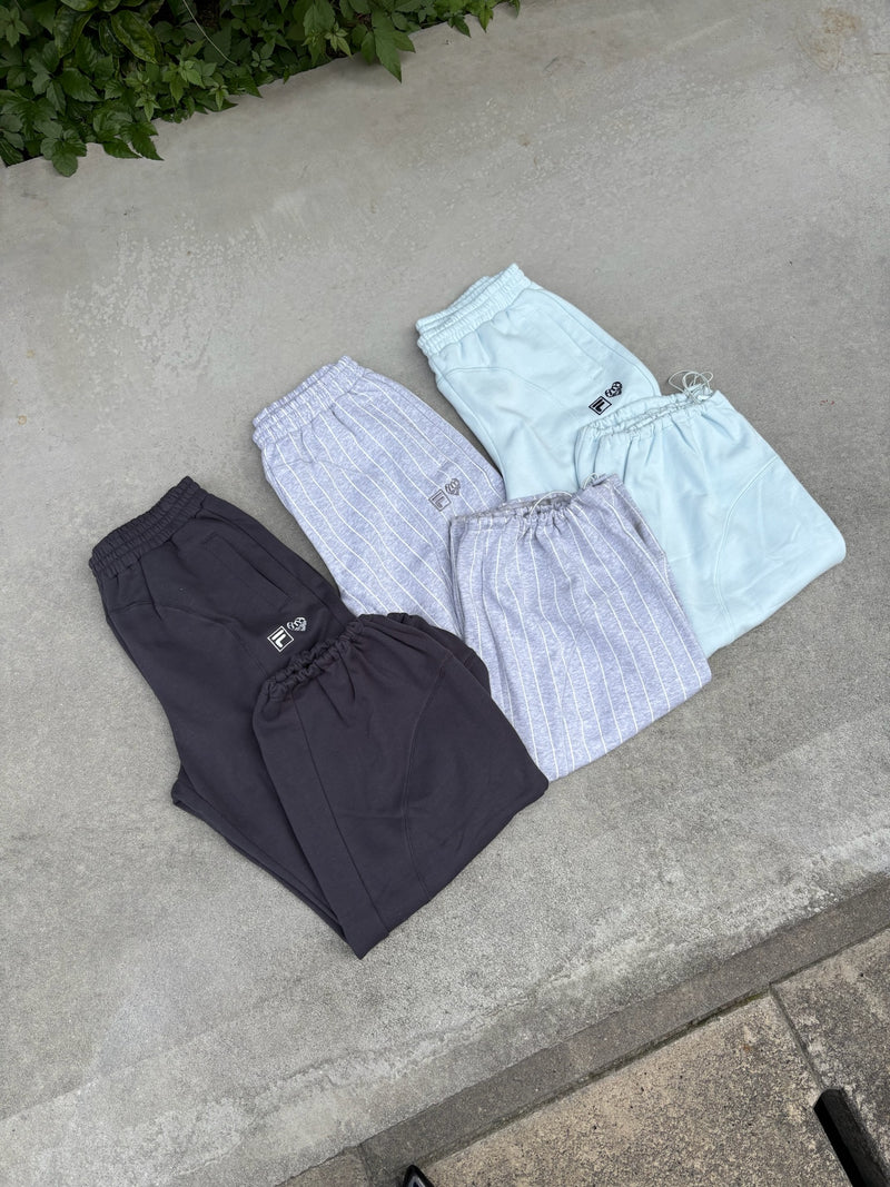 FILA × HTH 스웨트팬츠 