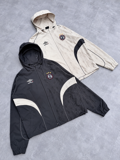 9090 × UMBRO 遇水變色尼龍連帽外套 