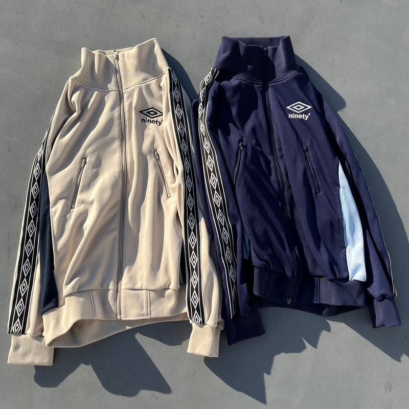 9090 × umbro Diamond Logo Track Jacket – YZ 9090 × umbro Diamond Logo Track Jacket – YZ