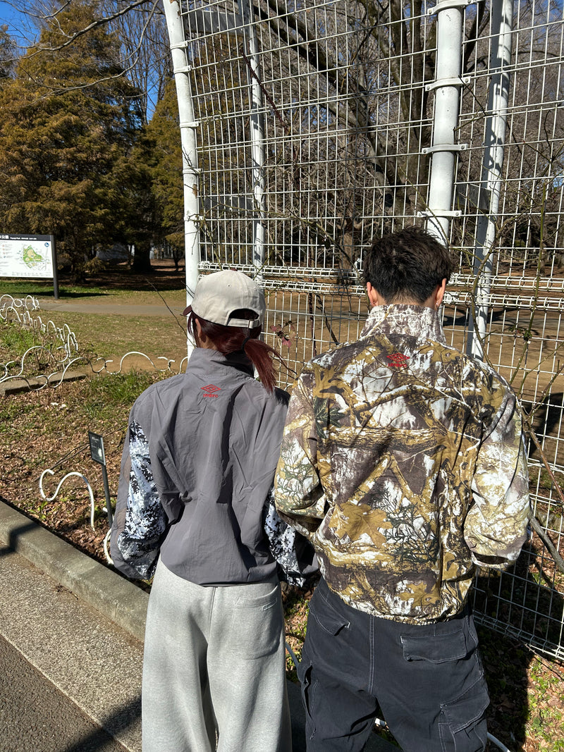 9090 × umbro Tech Nylon Jacket – YZ 9090 × umbro Tech Nylon Jacket – YZ