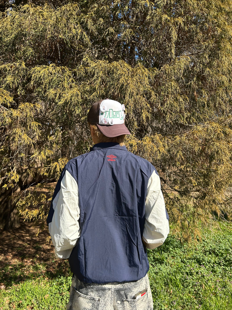 9090 × umbro Tech Nylon Jacket – YZ 9090 × umbro Tech Nylon Jacket – YZ