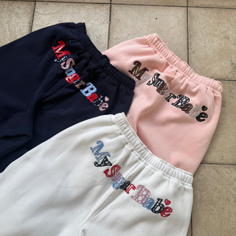 Assort check logo pants