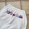 Assort check logo pants
