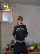 reversible check pattern zip stand