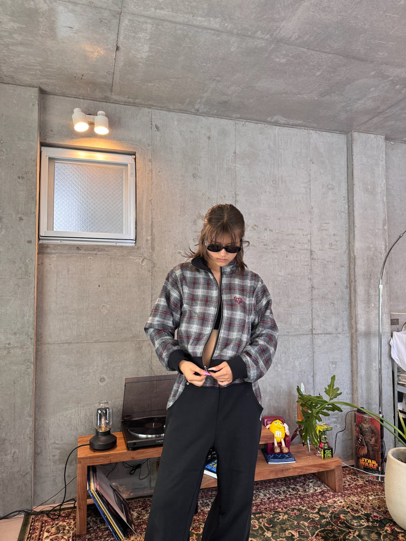 reversible check pattern zip stand