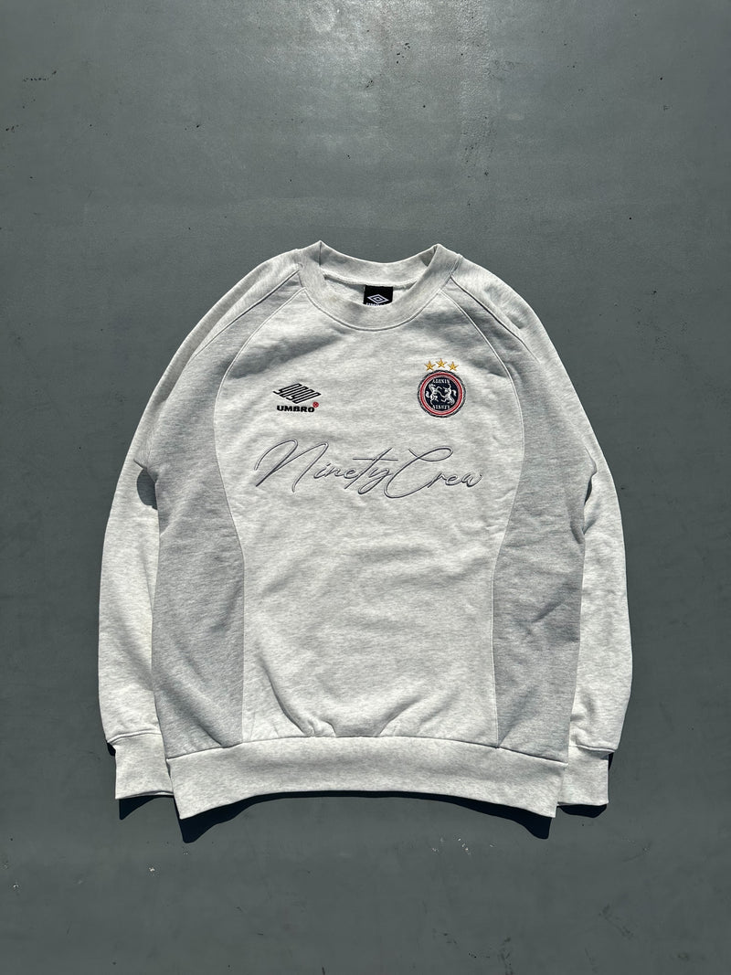 9090 × umbro Emblem Crewneck Sweat