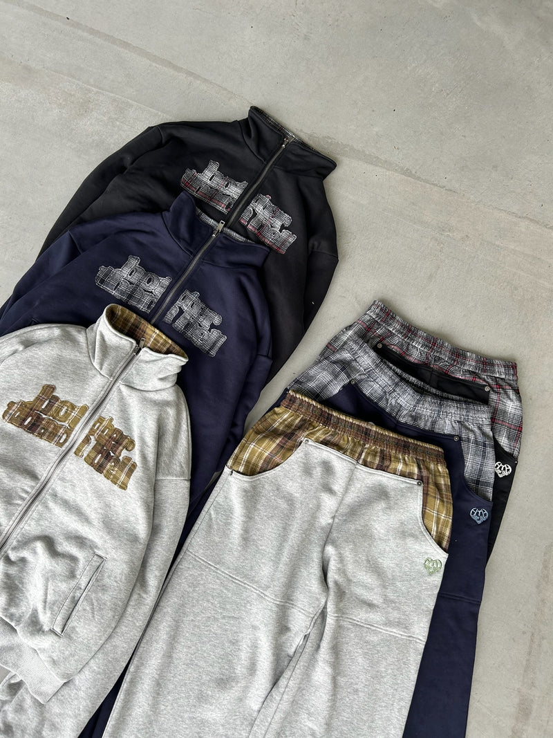 reversible check pattern zip stand