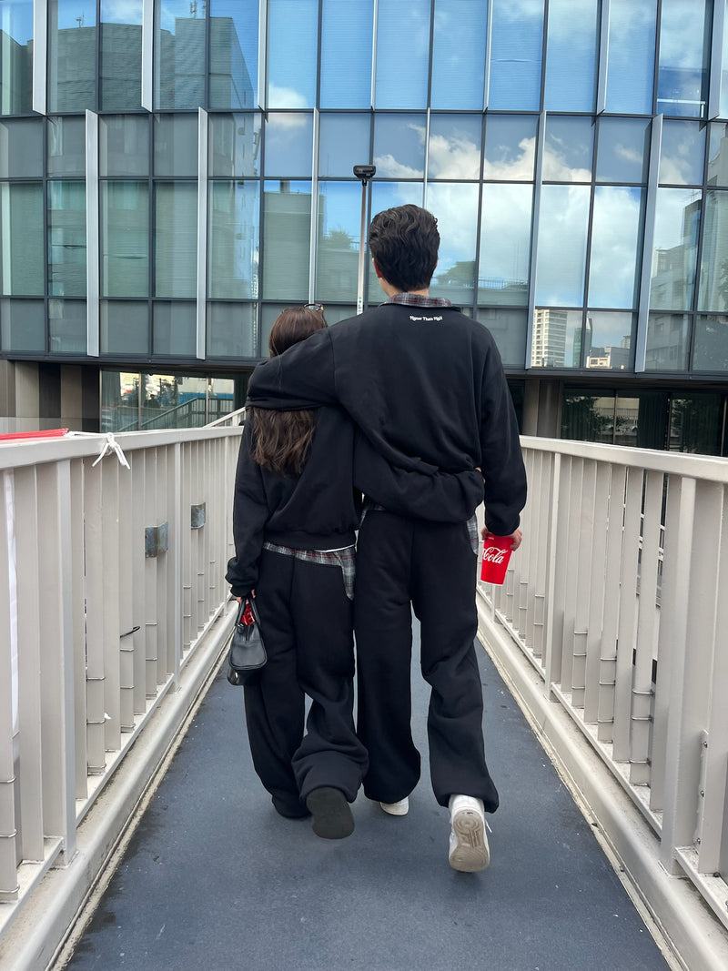 reversible check pattern zip stand