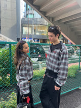 reversible check pattern zip stand