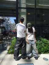 平成标志闪亮印花牛仔裤 