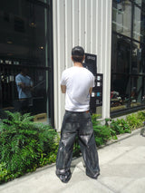 平成标志闪亮印花牛仔裤 