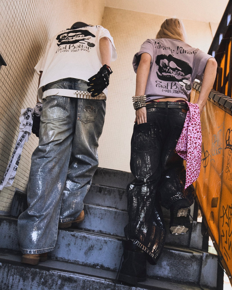 平成标志闪亮印花牛仔裤 