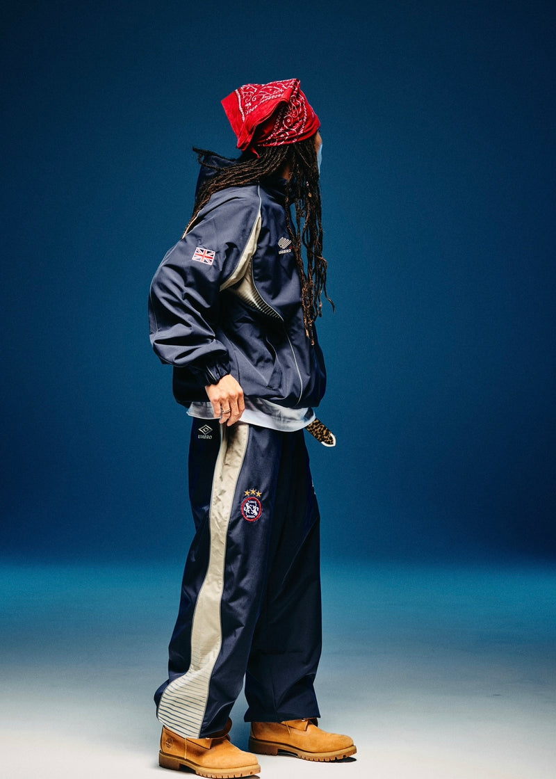 9090 × umbro Gradation Nylon Pants 