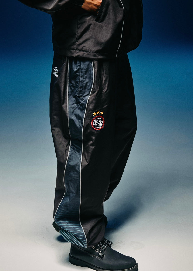 9090 × umbro Gradation Nylon Pants 