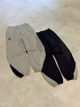 9090 × UMBRO 反光拼接運動長褲 