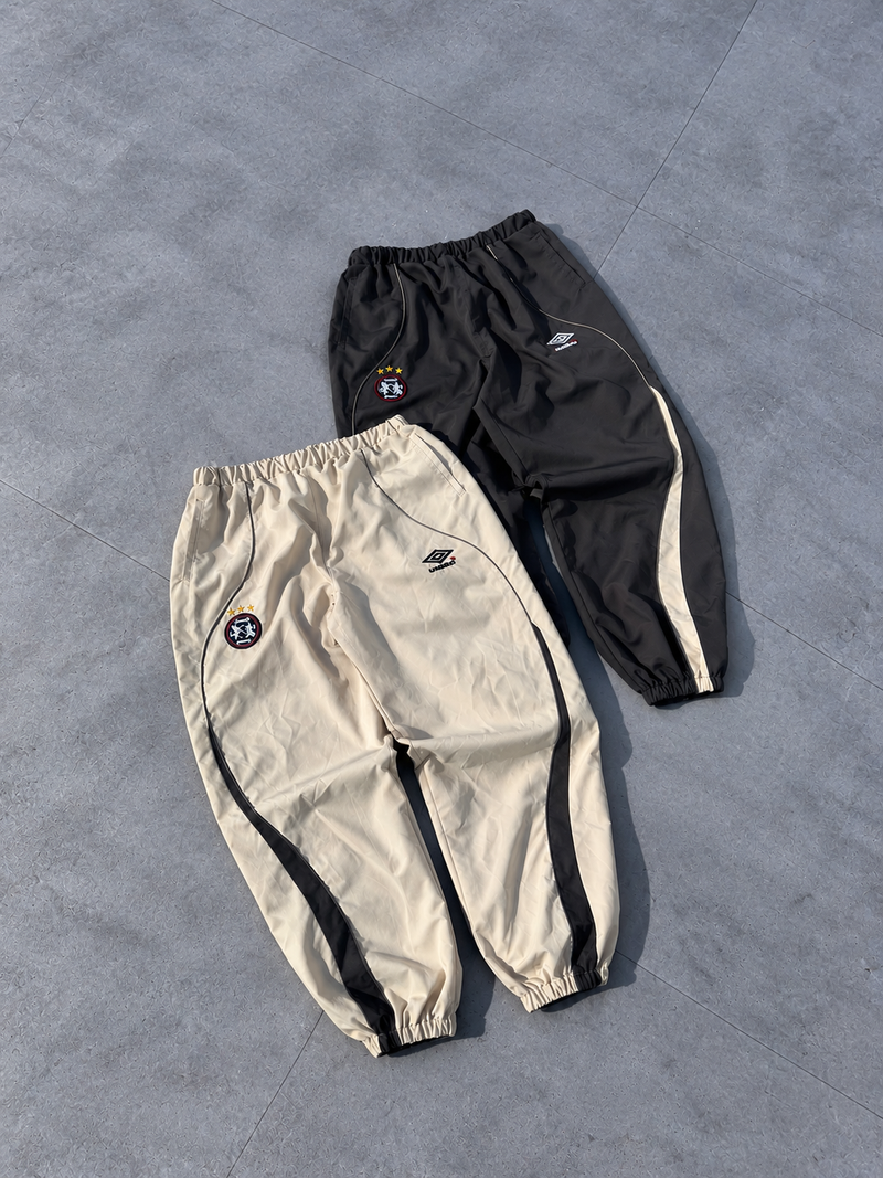 9090 × UMBRO Water-Reactive Nylon Pants – YZ