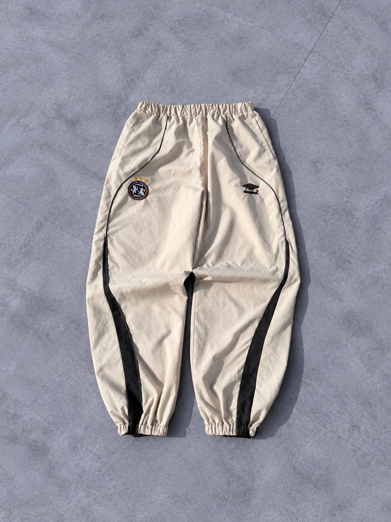 9090 × UMBRO Water-Reactive Nylon Pants – YZ