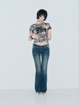 Tribal Logo Low-Rise Denim Pants 