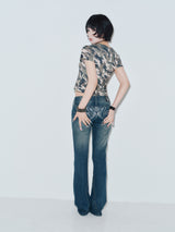 Tribal Logo Low-Rise Denim Pants 