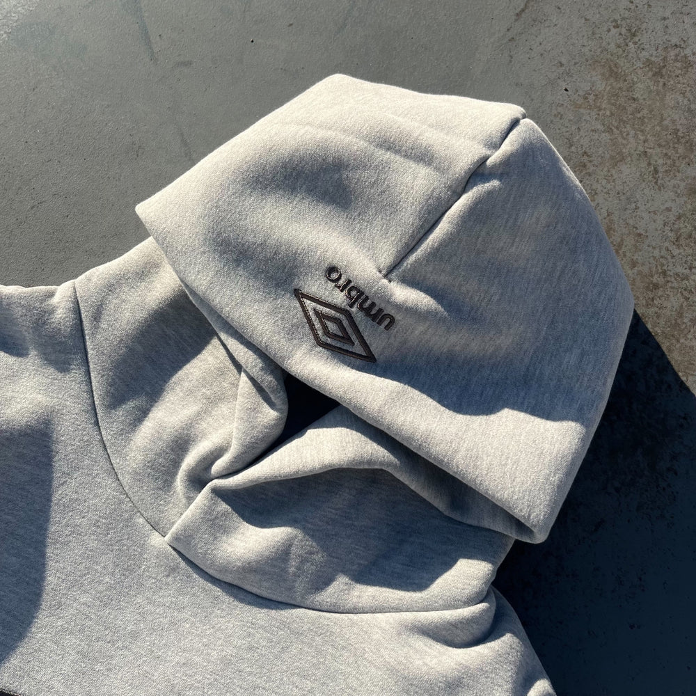 9090 × umbro Collaboration Logo Hoodie 9090 × umbro Collaboration Logo Hoodie – YZ
