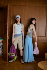 背の喪失感とリボン結びタンク