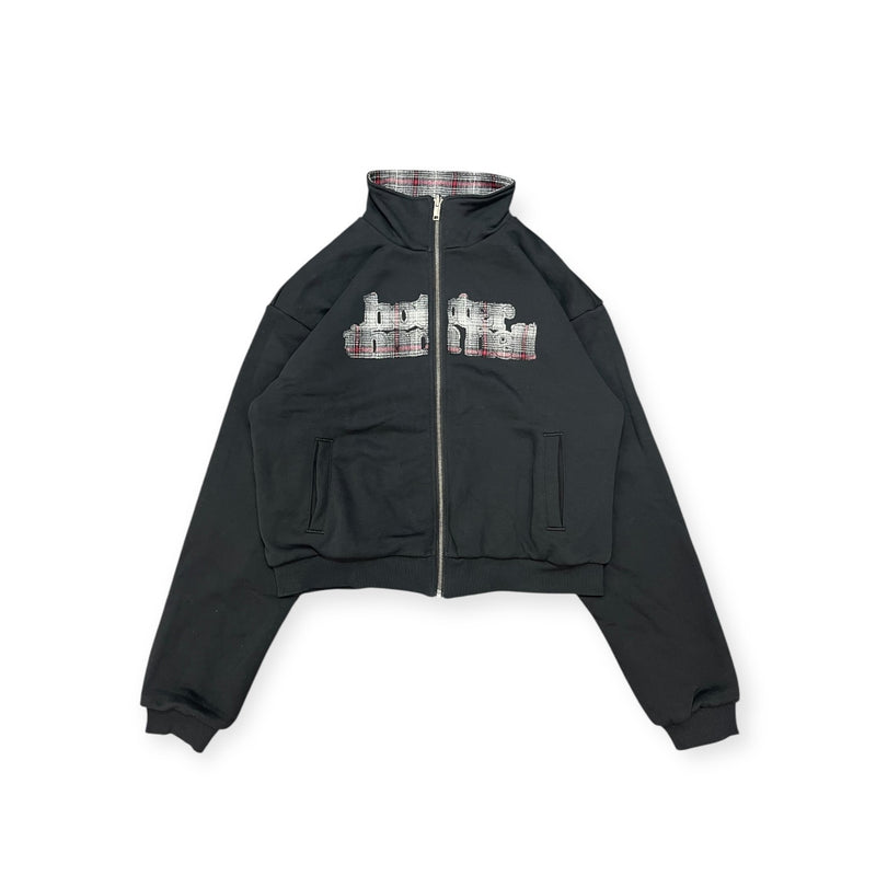 reversible check pattern zip stand