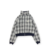 reversible check pattern zip stand