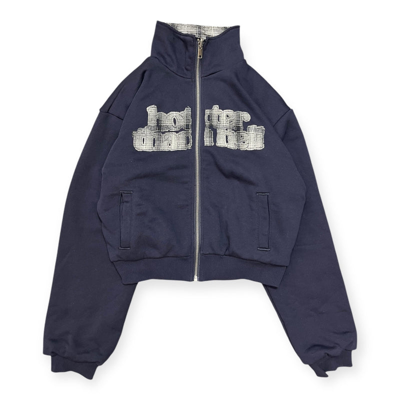 reversible check pattern zip stand