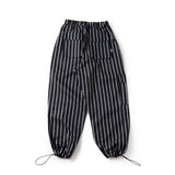 student apathy stripe nylon pants